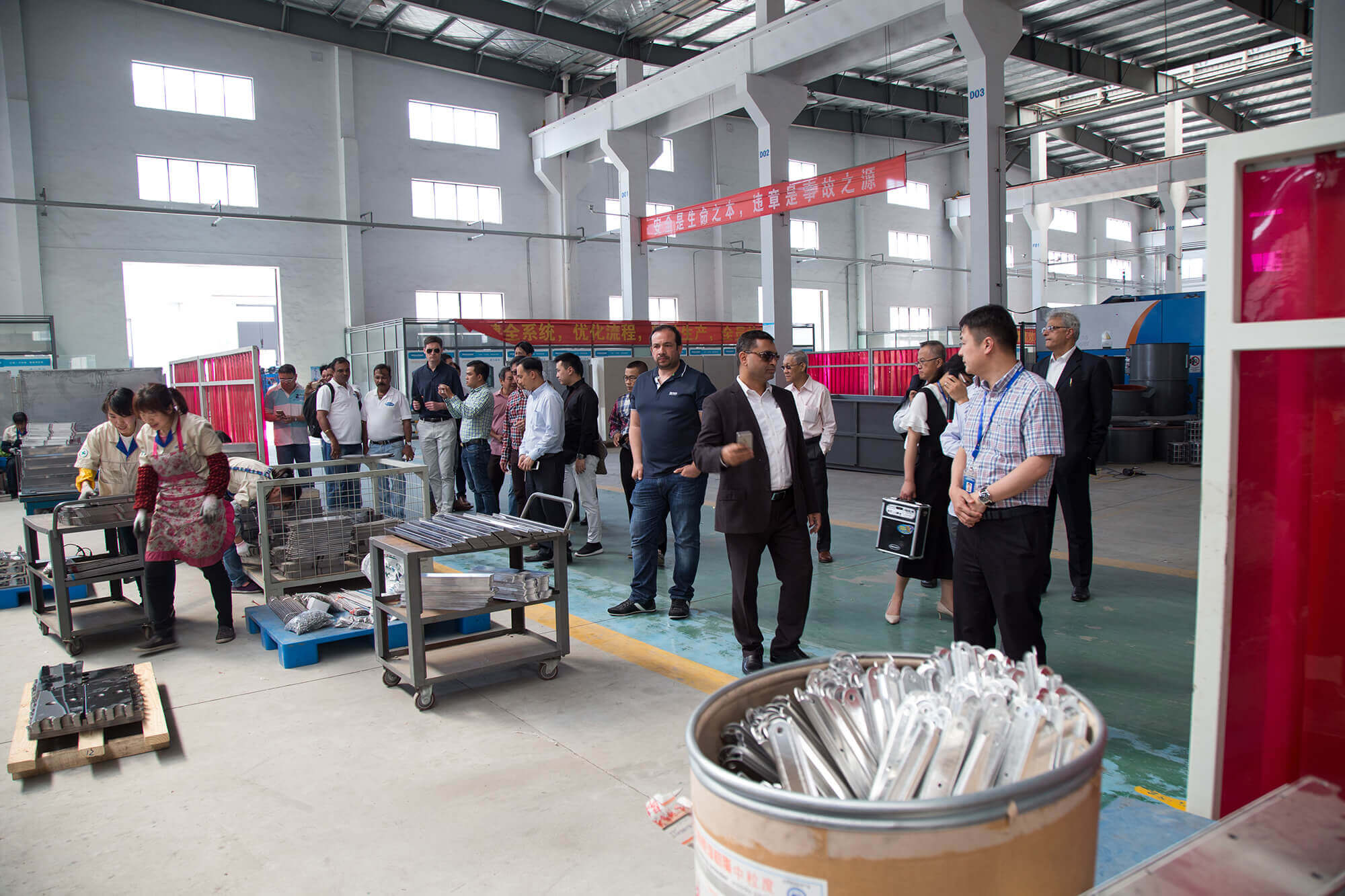 Clients observing ESP assembly line